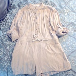 Beige short romper with quarter length sleeves